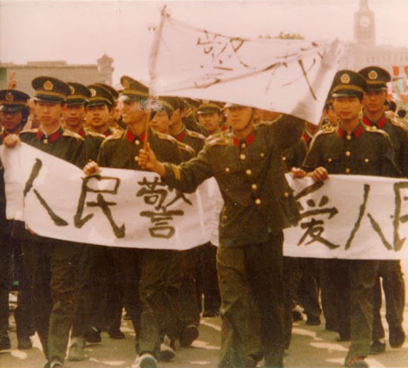Police cadets joining the protest march on Changan Avenue on May 18, 1989